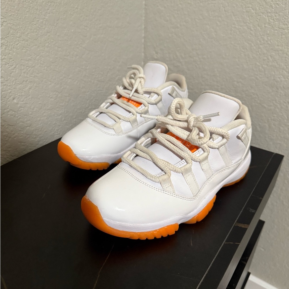 Jordan White and Orange Sneakers with Mid-Cut Design